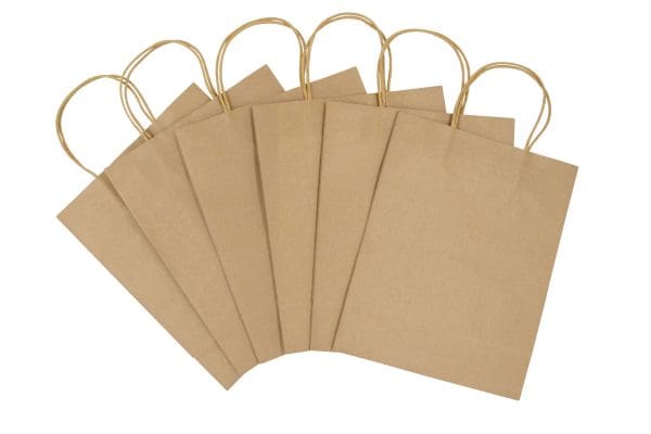 Le sac cadeau kraft décoré en fonction de l'évènement